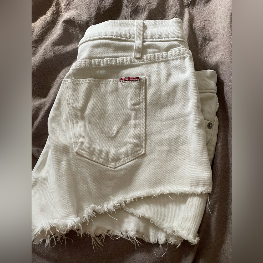 White Hudson denim shorts.
